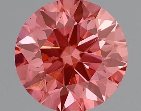 Loose Diamond - ROUND 0.58ct Fancy Vivid Pink VS1: Loose Diamond - ROUND 0.58ct Fancy Vivid Pink VS1 Source: This is a real non-mined Diamond that has been grown in a lab Shape: ROUND Carats: 0.58 Color: Fancy Vivid Pink Certification: IGI Video: