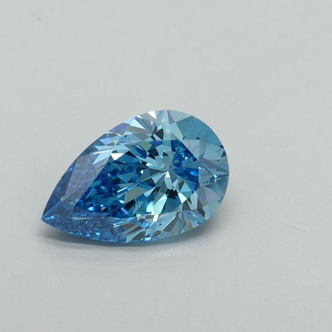 Loose Diamond - PEAR 1.0ct Fancy Vivid Blue VS1: Loose Diamond - PEAR 1.0ct Fancy Vivid Blue VS1 Source: This is a real non-mined Diamond that has been grown in a lab Shape: PEAR Carats: 1.0 Color: Fancy Vivid Blue Certification: IGI Video: