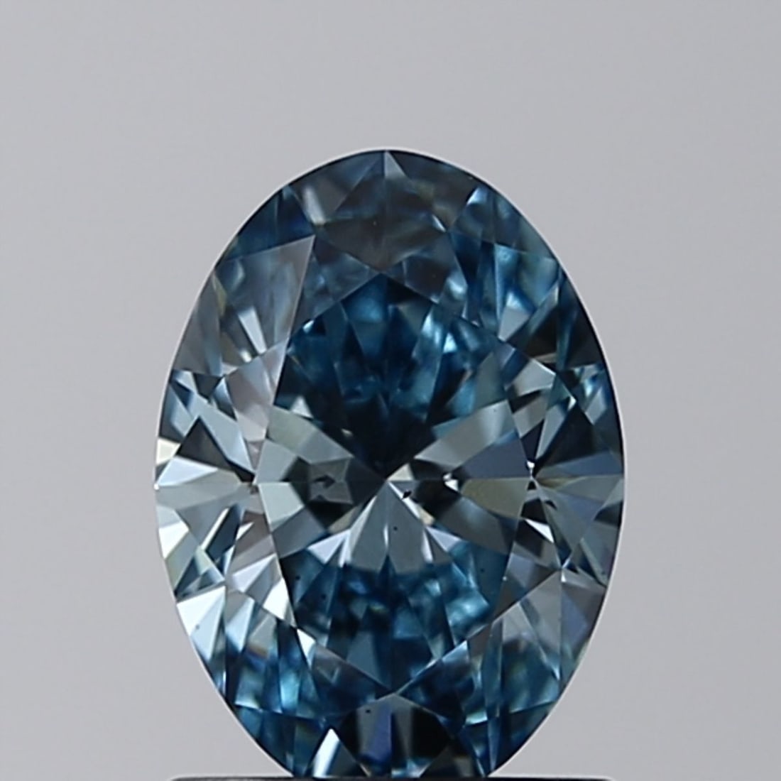 Loose Diamond - OVAL 1.03ct Fancy Vivid Blue VS2: Loose Diamond - OVAL 1.03ct Fancy Vivid Blue VS2 Source: This is a real non-mined Diamond that has been grown in a lab Shape: OVAL Carats: 1.03 Color: Fancy Vivid Blue Certification: IGI Video: