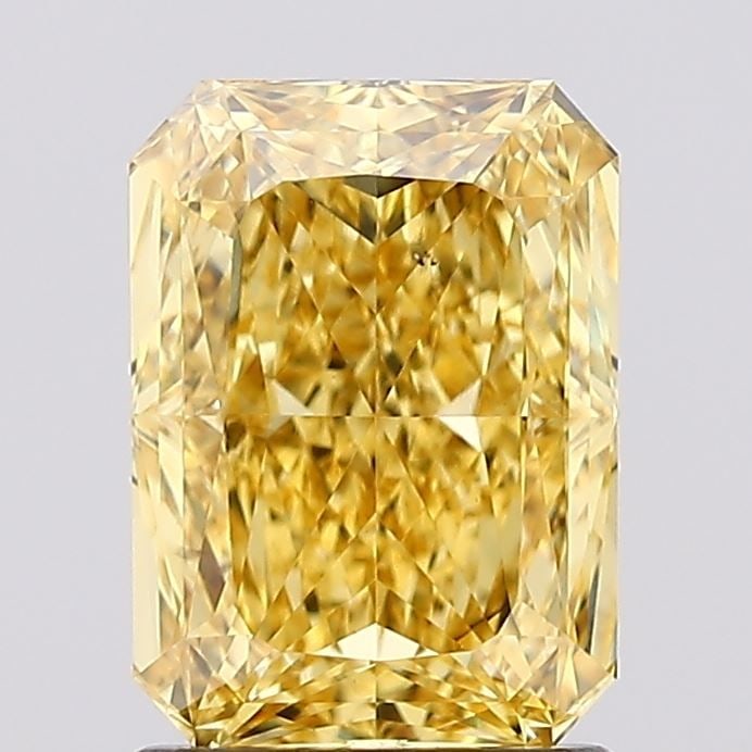 Loose Diamond - RADIANT 1.61ct Fancy Vivid Yellow VS1: Loose Diamond - RADIANT 1.61ct Fancy Vivid Yellow VS1 Source: This is a real non-mined Diamond that has been grown in a lab Shape: RADIANT Carats: 1.61 Color: Fancy Vivid Yellow Certification: IGI Vid