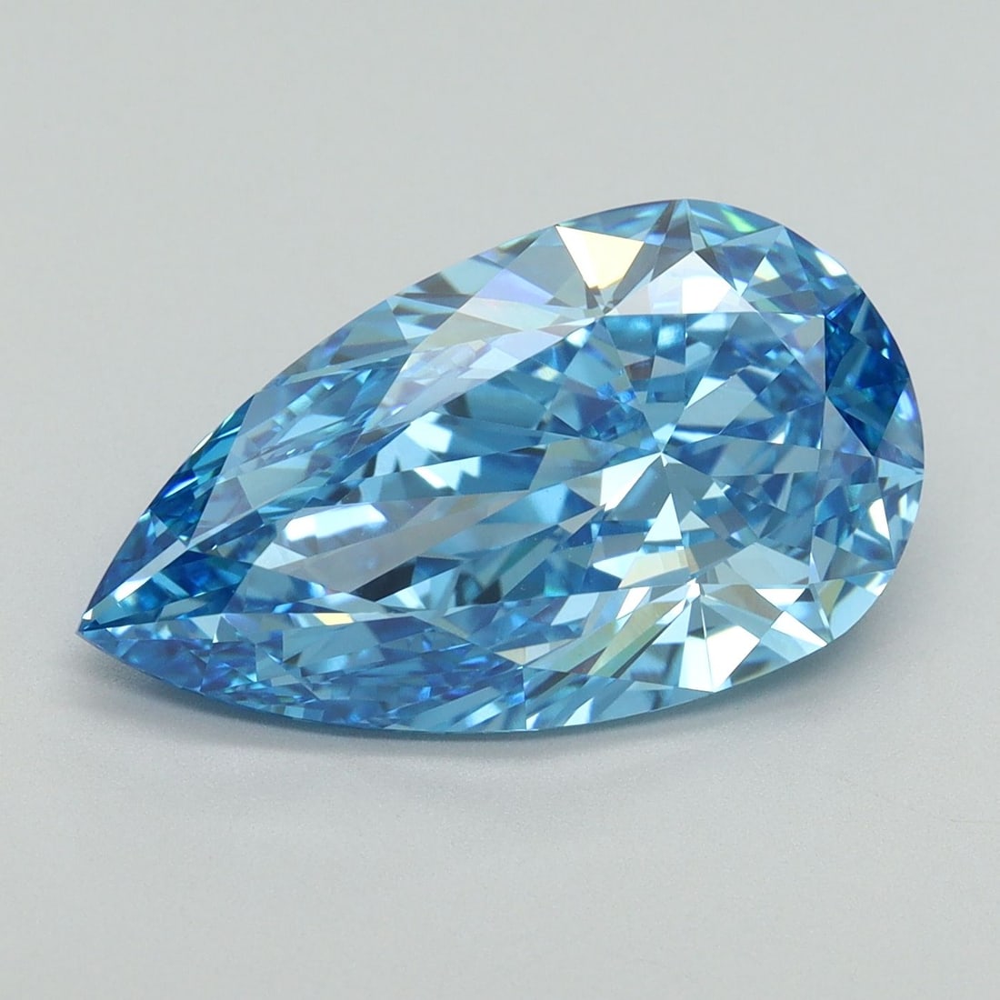 Loose Diamond - PEAR 5.3ct Fancy Vivid Blue VVS2: Loose Diamond - PEAR 5.3ct Fancy Vivid Blue VVS2 Source: This is a real non-mined Diamond that has been grown in a lab Shape: PEAR Carats: 5.3 Color: Fancy Vivid Blue Certification: IGI Video: