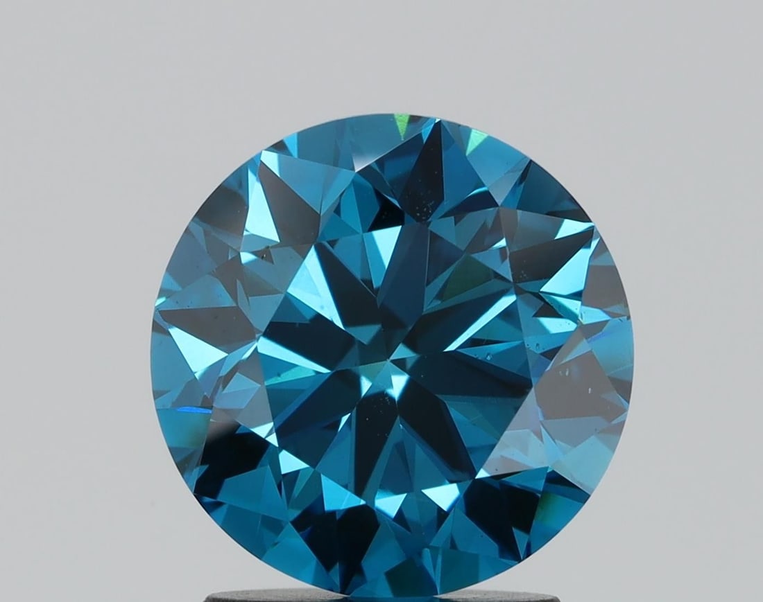 Loose Diamond - ROUND 2.16ct Fancy Blue VS2: Loose Diamond - ROUND 2.16ct Fancy Blue VS2 Source: This is a real non-mined Diamond that has been grown in a lab Shape: ROUND Carats: 2.16 Color: Fancy Blue Certification: NONE Video: