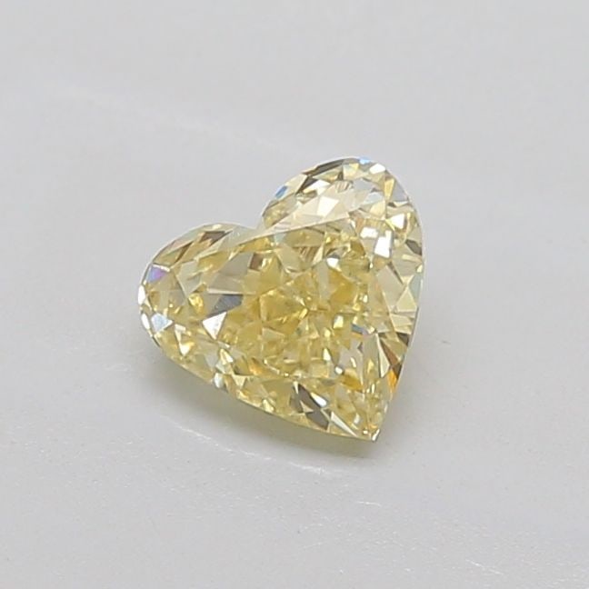 Loose Diamond - HEART 0.82ct Fancy Yellow VS2: Loose Diamond - HEART 0.82ct Fancy Yellow VS2 Source: This is a real non-mined Diamond that has been grown in a lab Shape: HEART Carats: 0.82 Color: Fancy Yellow Certification: IGI Video: