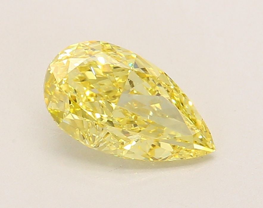 Loose Diamond - PEAR 1.17ct Fancy Vivid Yellow VVS2: Loose Diamond - PEAR 1.17ct Fancy Vivid Yellow VVS2 Source: This is a real non-mined Diamond that has been grown in a lab Shape: PEAR Carats: 1.17 Color: Fancy Vivid Yellow Certification: IGI Video: