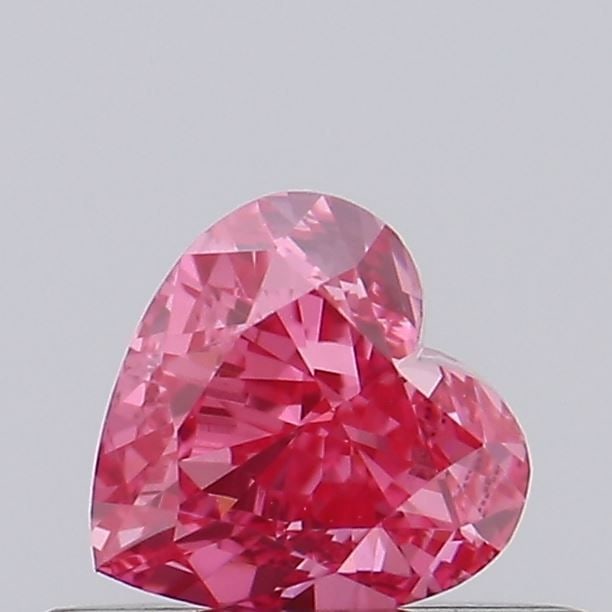 Loose Diamond - HEART 0.44ct Fancy Vivid Pink VS1: Loose Diamond - HEART 0.44ct Fancy Vivid Pink VS1 Source: This is a real non-mined Diamond that has been grown in a lab Shape: HEART Carats: 0.44 Color: Fancy Vivid Pink Certification: IGI Video:
