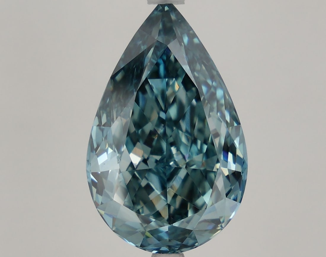Loose Diamond - PEAR 6.88ct Fancy Vivid Greenish Blue VS1: Loose Diamond - PEAR 6.88ct Fancy Vivid Greenish Blue VS1 Source: This is a real non-mined Diamond that has been grown in a lab Shape: PEAR Carats: 6.88 Color: Fancy Vivid Greenish Blue Certification: