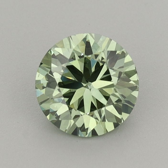 Loose Diamond - ROUND 0.73ct Fancy Vivid Green VS2: Loose Diamond - ROUND 0.73ct Fancy Vivid Green VS2 Source: This is a real non-mined Diamond that has been grown in a lab Shape: ROUND Carats: 0.73 Color: Fancy Vivid Green Certification: IGI Video: