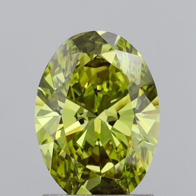 Loose Diamond - OVAL 1.55ct Fancy Vivid Yellowish Green VVS2: Loose Diamond - OVAL 1.55ct Fancy Vivid Yellowish Green VVS2 Source: This is a real non-mined Diamond that has been grown in a lab Shape: OVAL Carats: 1.55 Color: Fancy Vivid Yellowish Green Certifica