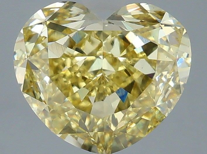 Loose Diamond - HEART 3.05ct Fancy Intense Yellow VS1: Loose Diamond - HEART 3.05ct Fancy Intense Yellow VS1 Source: This is a real non-mined Diamond that has been grown in a lab Shape: HEART Carats: 3.05 Color: Fancy Intense Yellow Certification: IGI Vid