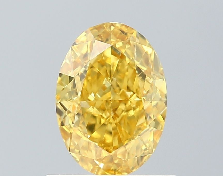 Loose Diamond - OVAL 0.92ct Fancy Vivid Yellow VS1: Loose Diamond - OVAL 0.92ct Fancy Vivid Yellow VS1 Source: This is a real non-mined Diamond that has been grown in a lab Shape: OVAL Carats: 0.92 Color: Fancy Vivid Yellow Certification: NONE Video: