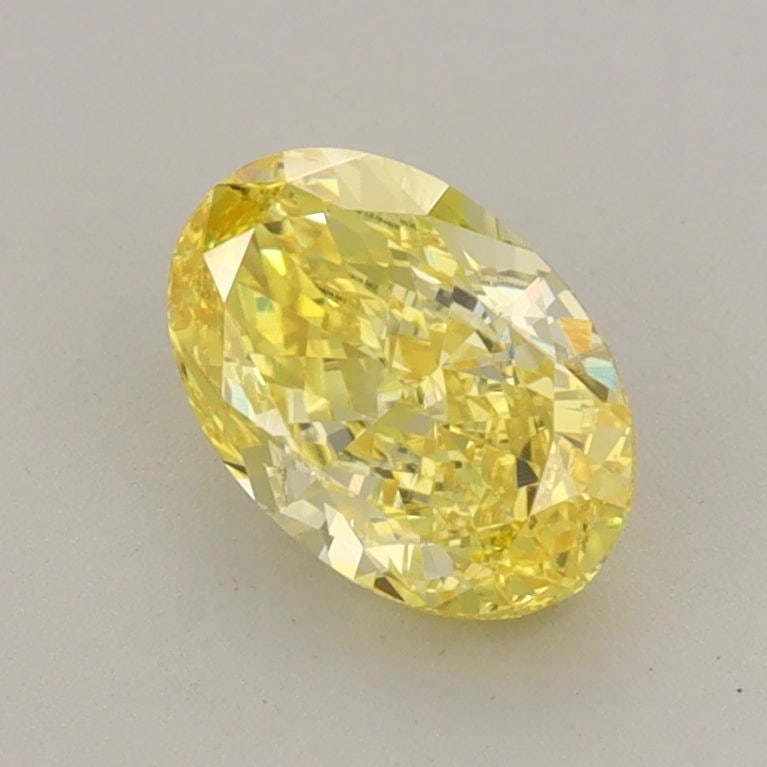 Loose Diamond - OVAL 1.03ct Fancy Vivid Yellow VS1: Loose Diamond - OVAL 1.03ct Fancy Vivid Yellow VS1 Source: This is a real non-mined Diamond that has been grown in a lab Shape: OVAL Carats: 1.03 Color: Fancy Vivid Yellow Certification: IGI PLEASE NO