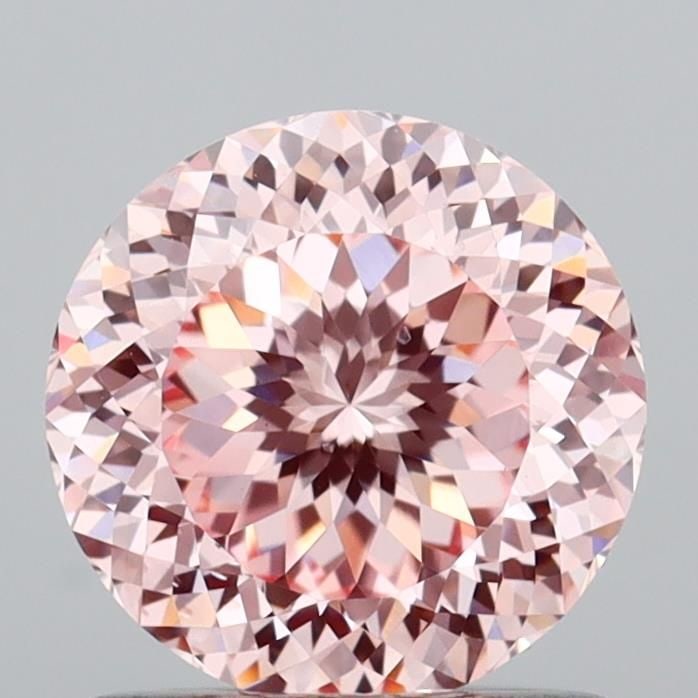Loose Diamond - ROUND 1.08ct Fancy Intense Pink VS1: Loose Diamond - ROUND 1.08ct Fancy Intense Pink VS1 Source: This is a real non-mined Diamond that has been grown in a lab Shape: ROUND Carats: 1.08 Color: Fancy Intense Pink Certification: IGI Video: