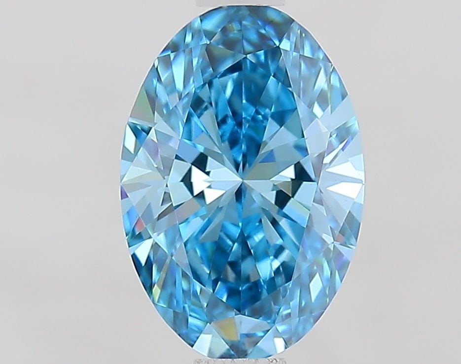 Loose Diamond - OVAL 1.07ct Fancy Vivid Blue VVS2: Loose Diamond - OVAL 1.07ct Fancy Vivid Blue VVS2 Source: This is a real non-mined Diamond that has been grown in a lab Shape: OVAL Carats: 1.07 Color: Fancy Vivid Blue Certification: IGI Video: