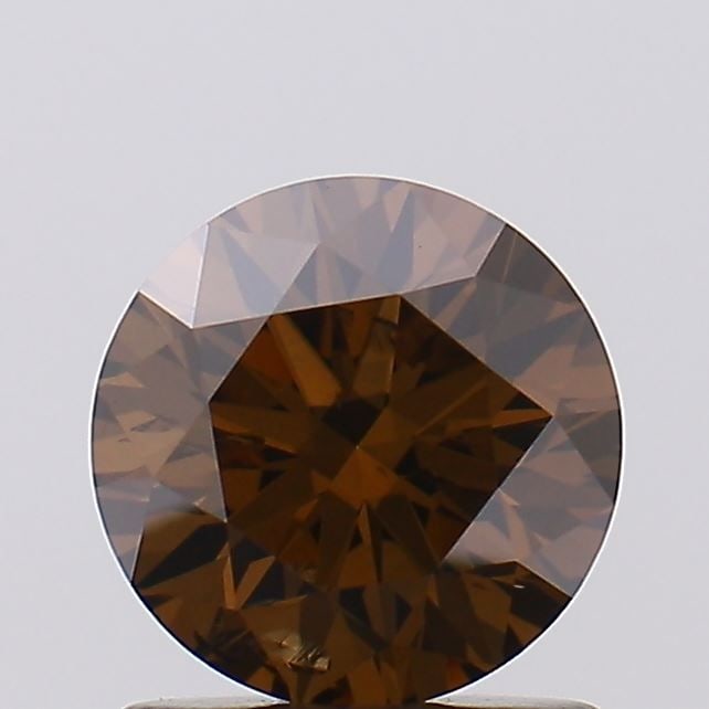 Loose Diamond - ROUND 1.12ct Fancy Deep Brown SI2: Loose Diamond - ROUND 1.12ct Fancy Deep Brown SI2 Source: This is a real non-mined Diamond that has been grown in a lab Shape: ROUND Carats: 1.12 Color: Fancy Deep Brown Certification: IGI Video: