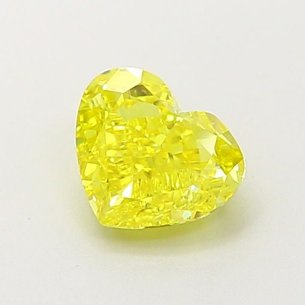 Loose Diamond - HEART 0.91ct Fancy Vivid Yellow VVS2: Loose Diamond - HEART 0.91ct Fancy Vivid Yellow VVS2 Source: This is a real non-mined Diamond that has been grown in a lab Shape: HEART Carats: 0.91 Color: Fancy Vivid Yellow Certification: IGI Video: