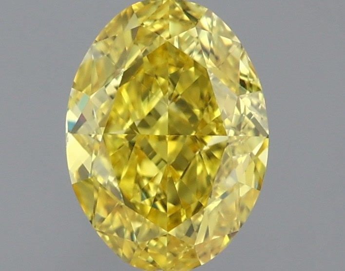 Loose Diamond - OVAL 1.01ct Fancy Vivid Yellow VVS2: Loose Diamond - OVAL 1.01ct Fancy Vivid Yellow VVS2 Source: This is a real non-mined Diamond that has been grown in a lab Shape: OVAL Carats: 1.01 Color: Fancy Vivid Yellow Certification: IGI Video:
