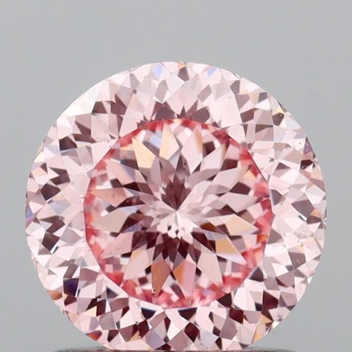 Loose Diamond - ROUND 1.08ct Fancy Intense Pink VS1: Loose Diamond - ROUND 1.08ct Fancy Intense Pink VS1 Source: This is a real non-mined Diamond that has been grown in a lab Shape: ROUND Carats: 1.08 Color: Fancy Intense Pink Certification: IGI Video: