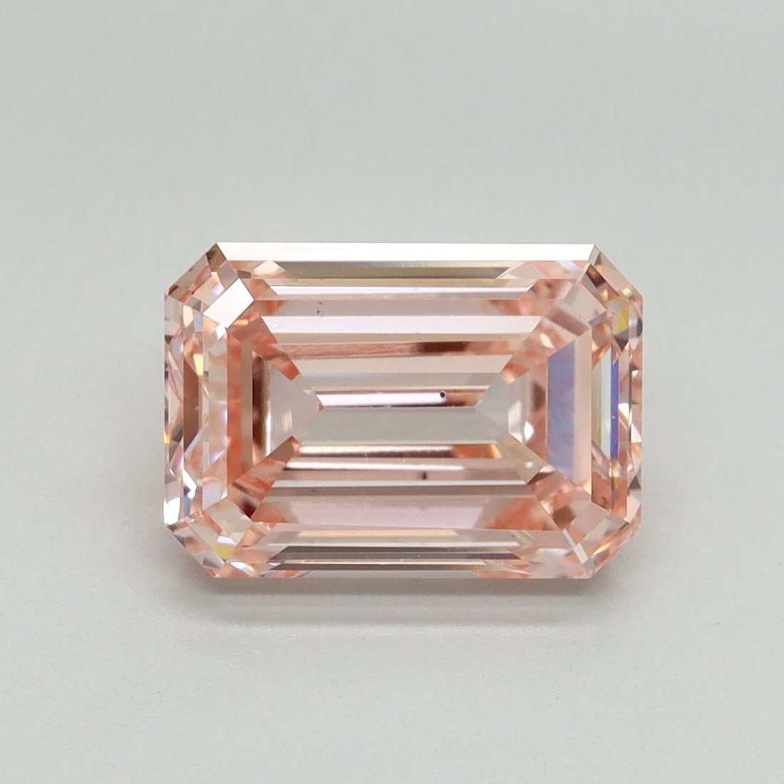 Loose Diamond - EMERALD 3.0ct Fancy Vivid Pink VS2: Loose Diamond - EMERALD 3.0ct Fancy Vivid Pink VS2 Source: This is a real non-mined Diamond that has been grown in a lab Shape: EMERALD Carats: 3.0 Color: Fancy Vivid Pink Certification: IGI Video: