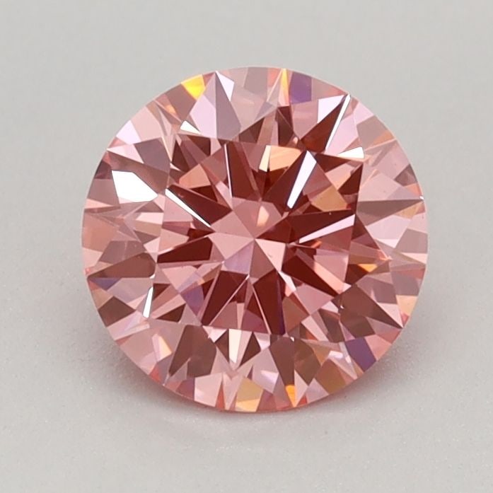 Ideal Loose Diamond - ROUND 0.72ct Fancy Vivid Pink VS1: Ideal Loose Diamond - ROUND 0.72ct Fancy Vivid Pink VS1 Source: This is a real non-mined Diamond that has been grown in a lab Shape: ROUND Carats: 0.72 Color: Fancy Vivid Pink Certification: IGI Video