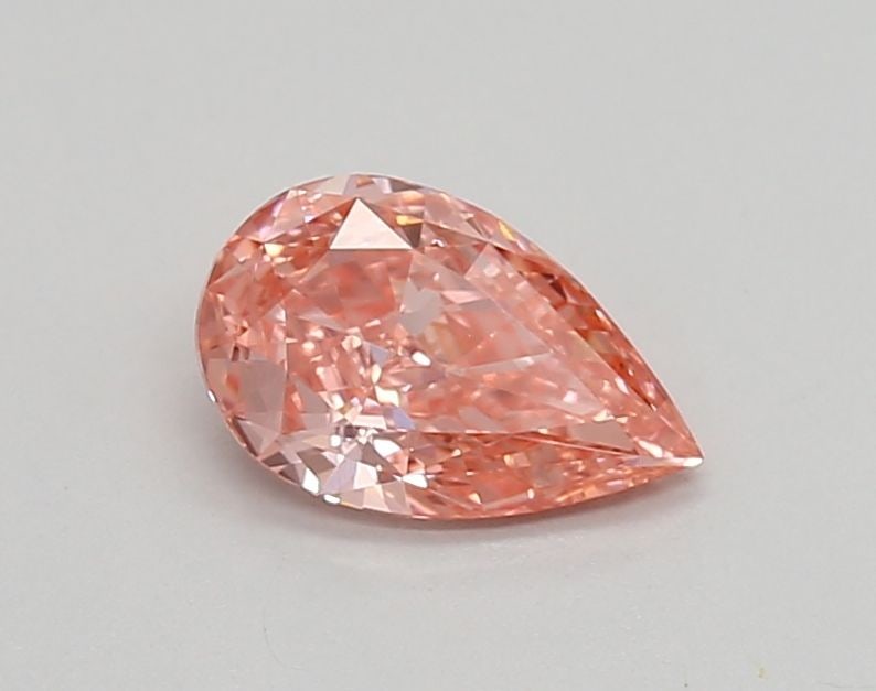 Loose Diamond - PEAR 0.63ct Fancy Vivid Pink VVS2: Loose Diamond - PEAR 0.63ct Fancy Vivid Pink VVS2 Source: This is a real non-mined Diamond that has been grown in a lab Shape: PEAR Carats: 0.63 Color: Fancy Vivid Pink Certification: IGI Video: