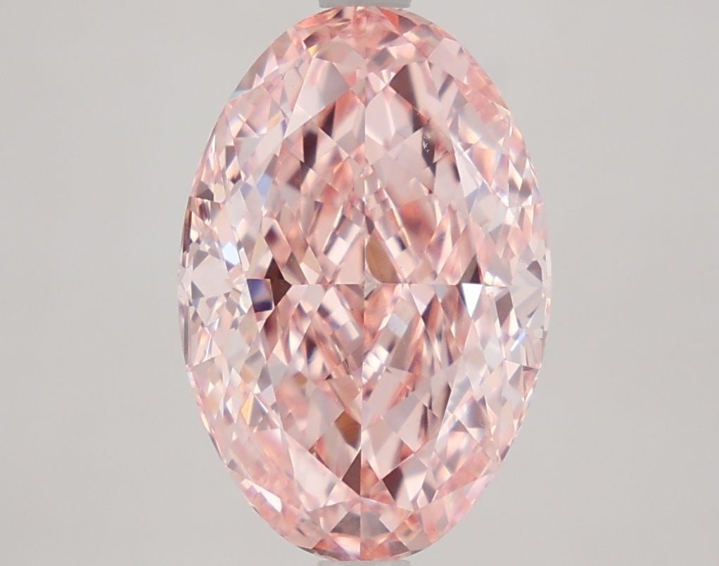Loose Diamond - OVAL 4.21ct Fancy Vivid Pink VVS2: Loose Diamond - OVAL 4.21ct Fancy Vivid Pink VVS2 Source: This is a real non-mined Diamond that has been grown in a lab Shape: OVAL Carats: 4.21 Color: Fancy Vivid Pink Certification: IGI Video: