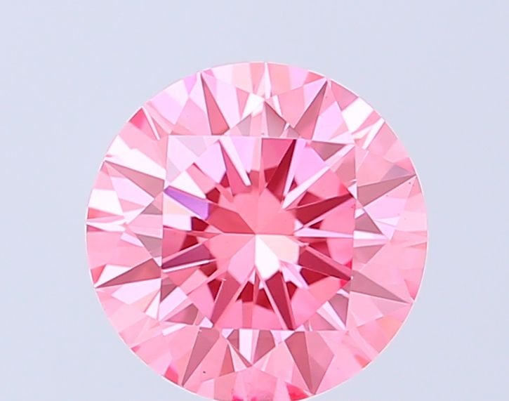 Loose Diamond - ROUND 1.5ct Fancy Vivid Pink VS1: Loose Diamond - ROUND 1.5ct Fancy Vivid Pink VS1 Source: This is a real non-mined Diamond that has been grown in a lab Shape: ROUND Carats: 1.5 Color: Fancy Vivid Pink Certification: IGI Video: