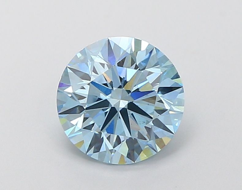 Ideal Loose Diamond - ROUND 1.83ct Fancy Vivid Blue VS2: Ideal Loose Diamond - ROUND 1.83ct Fancy Vivid Blue VS2 Source: This is a real non-mined Diamond that has been grown in a lab Shape: ROUND Carats: 1.83 Color: Fancy Vivid Blue Certification: IGI Video