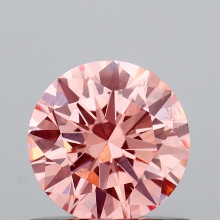 Loose Diamond - ROUND 0.62ct Fancy Intense Pink SI1: Loose Diamond - ROUND 0.62ct Fancy Intense Pink SI1 Source: This is a real non-mined Diamond that has been grown in a lab Shape: ROUND Carats: 0.62 Color: Fancy Intense Pink Certification: IGI Video: