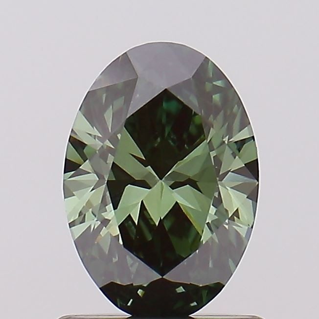 Loose Diamond - OVAL 0.79ct Fancy Vivid Green VVS2: Loose Diamond - OVAL 0.79ct Fancy Vivid Green VVS2 Source: This is a real non-mined Diamond that has been grown in a lab Shape: OVAL Carats: 0.79 Color: Fancy Vivid Green Certification: NONE Video: