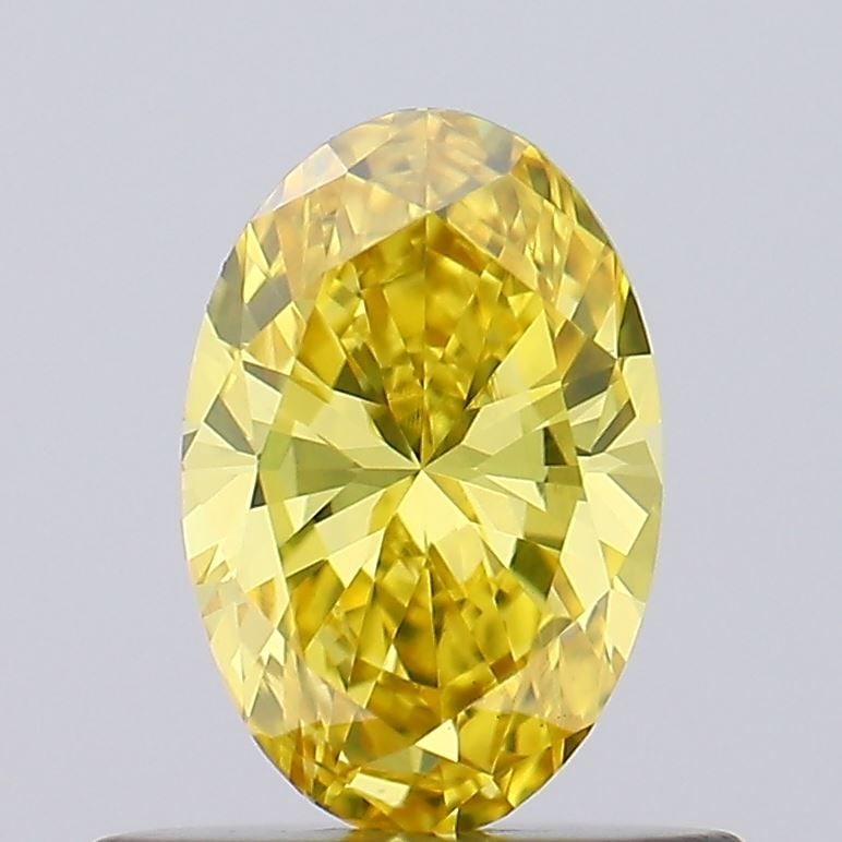 Loose Diamond - OVAL 0.49ct Fancy Vivid Yellow VS1: Loose Diamond - OVAL 0.49ct Fancy Vivid Yellow VS1 Source: This is a real non-mined Diamond that has been grown in a lab Shape: OVAL Carats: 0.49 Color: Fancy Vivid Yellow Certification: IGI Video: