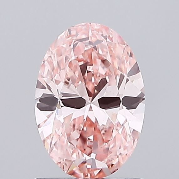 Loose Diamond - OVAL 0.97ct Fancy Vivid Pink VS1: Loose Diamond - OVAL 0.97ct Fancy Vivid Pink VS1 Source: This is a real non-mined Diamond that has been grown in a lab Shape: OVAL Carats: 0.97 Color: Fancy Vivid Pink Certification: IGI Video: