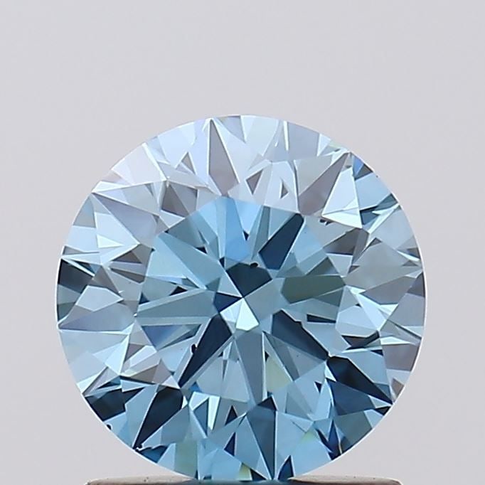Ideal Loose Diamond - ROUND 1.27ct Fancy Vivid Blue VS2: Ideal Loose Diamond - ROUND 1.27ct Fancy Vivid Blue VS2 Source: This is a real non-mined Diamond that has been grown in a lab Shape: ROUND Carats: 1.27 Color: Fancy Vivid Blue Certification: IGI Video