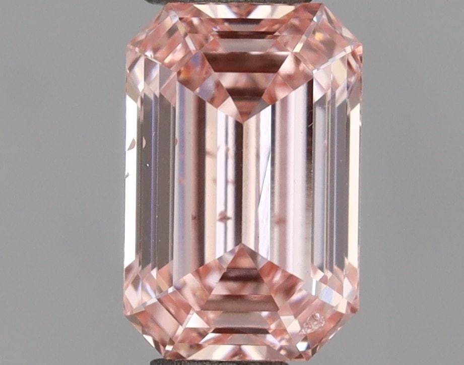 Loose Diamond - EMERALD 0.65ct Fancy Intense Pink VS2: Loose Diamond - EMERALD 0.65ct Fancy Intense Pink VS2 Source: This is a real non-mined Diamond that has been grown in a lab Shape: EMERALD Carats: 0.65 Color: Fancy Intense Pink Certification: IGI Vid