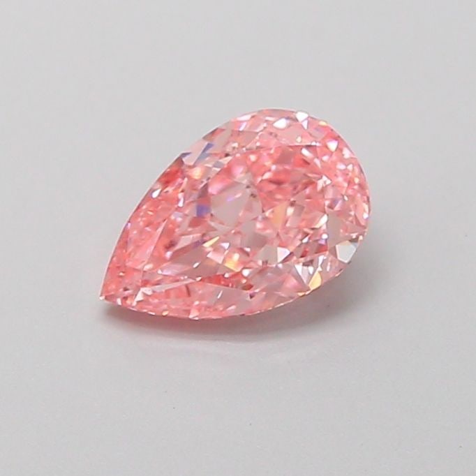 Loose Diamond - PEAR 0.71ct Fancy Vivid Pink VVS2: Loose Diamond - PEAR 0.71ct Fancy Vivid Pink VVS2 Source: This is a real non-mined Diamond that has been grown in a lab Shape: PEAR Carats: 0.71 Color: Fancy Vivid Pink Certification: IGI Video: