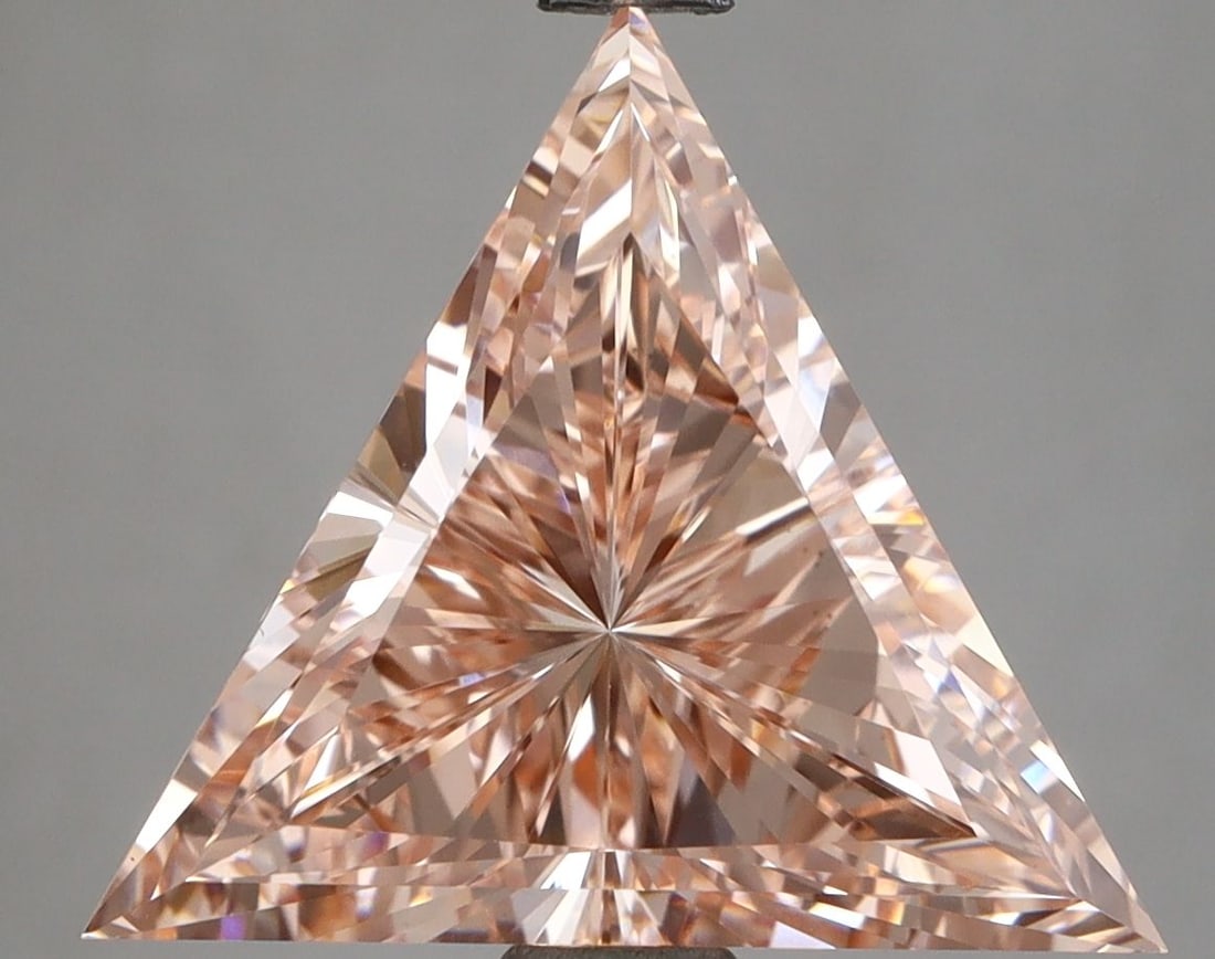 Loose Diamond - TRIANGULAR 3.3ct Fancy Vivid Pink VS1: Loose Diamond - TRIANGULAR 3.3ct Fancy Vivid Pink VS1 Source: This is a real non-mined Diamond that has been grown in a lab Shape: TRIANGULAR Carats: 3.3 Color: Fancy Vivid Pink Certification: IGI Vid