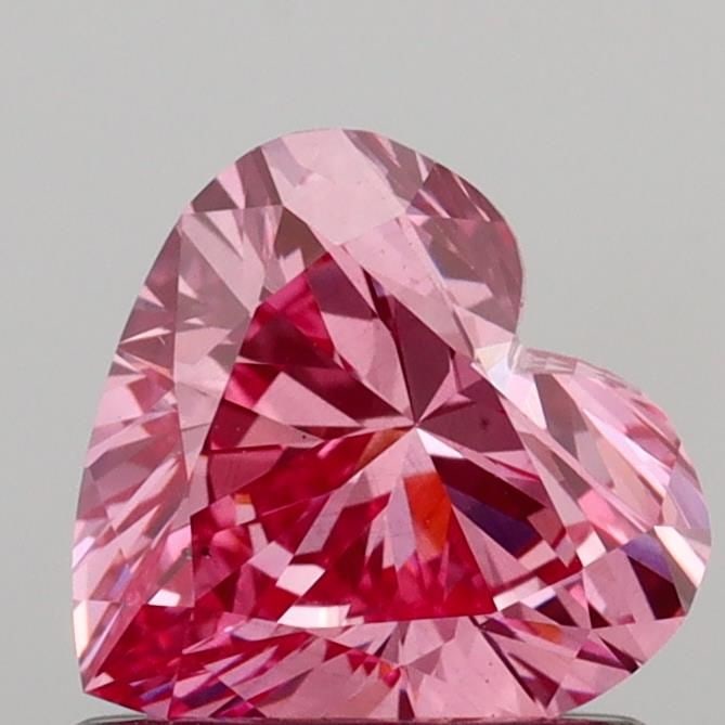 Loose Diamond - HEART 0.84ct Fancy Vivid Pink VS2: Loose Diamond - HEART 0.84ct Fancy Vivid Pink VS2 Source: This is a real non-mined Diamond that has been grown in a lab Shape: HEART Carats: 0.84 Color: Fancy Vivid Pink Certification: IGI Video: