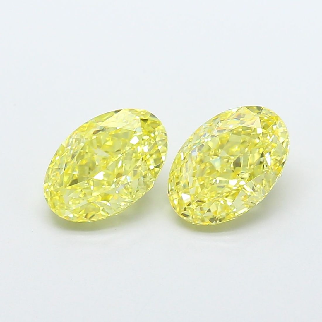 Loose Diamond - OVAL 2.01ct Fancy Intense Yellow VVS2: Loose Diamond - OVAL 2.01ct Fancy Intense Yellow VVS2 Source: This is a real non-mined Diamond that has been grown in a lab Shape: OVAL Carats: 2.01 Color: Fancy Intense Yellow Certification: IGI Vide