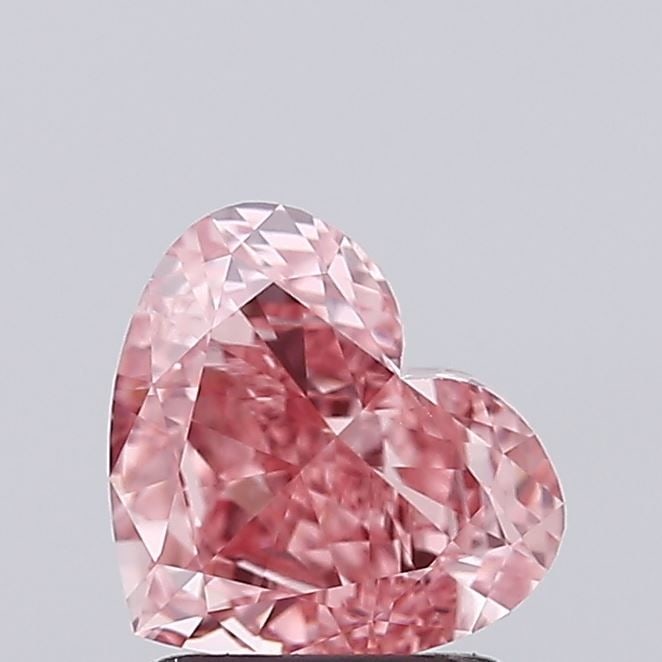 Loose Diamond - HEART 1.34ct Fancy Vivid Pink VS1: Loose Diamond - HEART 1.34ct Fancy Vivid Pink VS1 Source: This is a real non-mined Diamond that has been grown in a lab Shape: HEART Carats: 1.34 Color: Fancy Vivid Pink Certification: NONE Video: