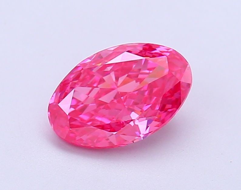 Loose Diamond - OVAL 1.29ct Fancy Vivid Pink VVS2: Loose Diamond - OVAL 1.29ct Fancy Vivid Pink VVS2 Source: This is a real non-mined Diamond that has been grown in a lab Shape: OVAL Carats: 1.29 Color: Fancy Vivid Pink Certification: IGI Video:
