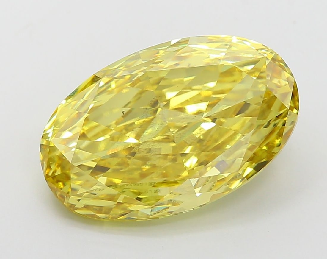 Loose Diamond - OVAL 8.38ct Fancy Vivid Yellow SI1: Loose Diamond - OVAL 8.38ct Fancy Vivid Yellow SI1 Source: This is a real non-mined Diamond that has been grown in a lab Shape: OVAL Carats: 8.38 Color: Fancy Vivid Yellow Certification: IGI Video: