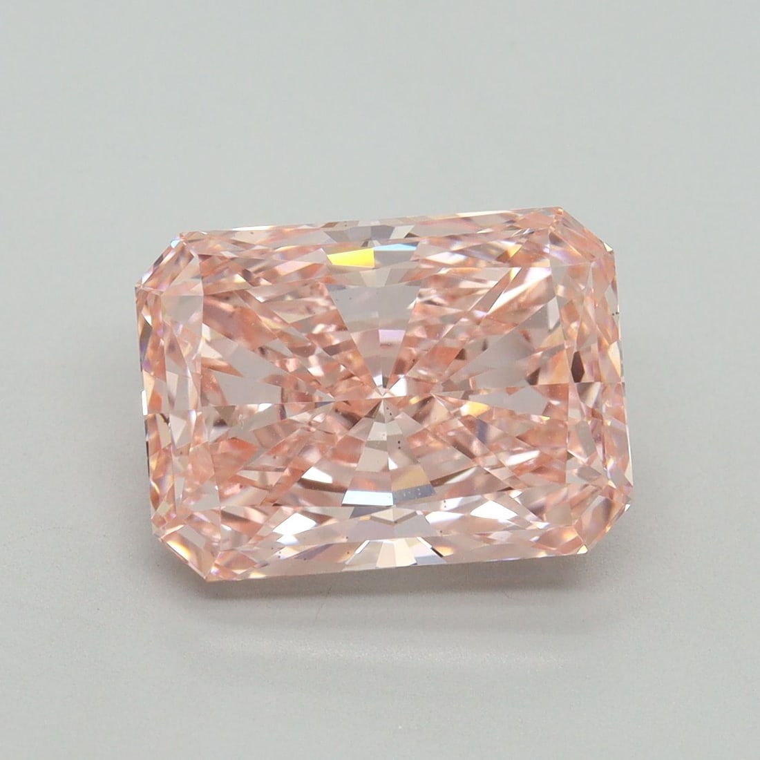 Loose Diamond - RADIANT 5.07ct Fancy Vivid Pink VS2: Loose Diamond - RADIANT 5.07ct Fancy Vivid Pink VS2 Source: This is a real non-mined Diamond that has been grown in a lab Shape: RADIANT Carats: 5.07 Color: Fancy Vivid Pink Certification: IGI Video: