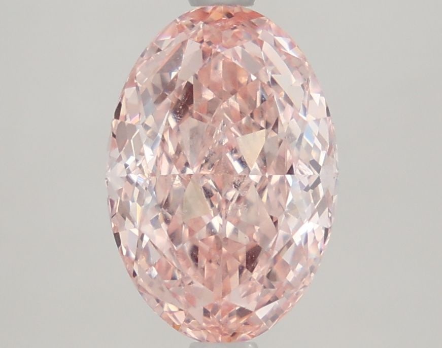 Loose Diamond - OVAL 2.66ct Fancy Intense Pink VVS2: Loose Diamond - OVAL 2.66ct Fancy Intense Pink VVS2 Source: This is a real non-mined Diamond that has been grown in a lab Shape: OVAL Carats: 2.66 Color: Fancy Intense Pink Certification: IGI Video: