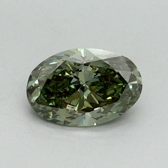 Loose Diamond - OVAL 0.5ct Fancy Vivid Green VS2: Loose Diamond - OVAL 0.5ct Fancy Vivid Green VS2 Source: This is a real non-mined Diamond that has been grown in a lab Shape: OVAL Carats: 0.5 Color: Fancy Vivid Green Certification: IGI Video: