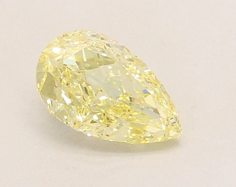 Loose Diamond - PEAR 1.29ct Fancy Yellow VVS2: Loose Diamond - PEAR 1.29ct Fancy Yellow VVS2 Source: This is a real non-mined Diamond that has been grown in a lab Shape: PEAR Carats: 1.29 Color: Fancy Yellow Certification: IGI Video:
