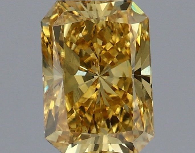 Loose Diamond - RADIANT 0.95ct Fancy Intense Yellow VS1: Loose Diamond - RADIANT 0.95ct Fancy Intense Yellow VS1 Source: This is a real non-mined Diamond that has been grown in a lab Shape: RADIANT Carats: 0.95 Color: Fancy Intense Yellow Certification: IGI