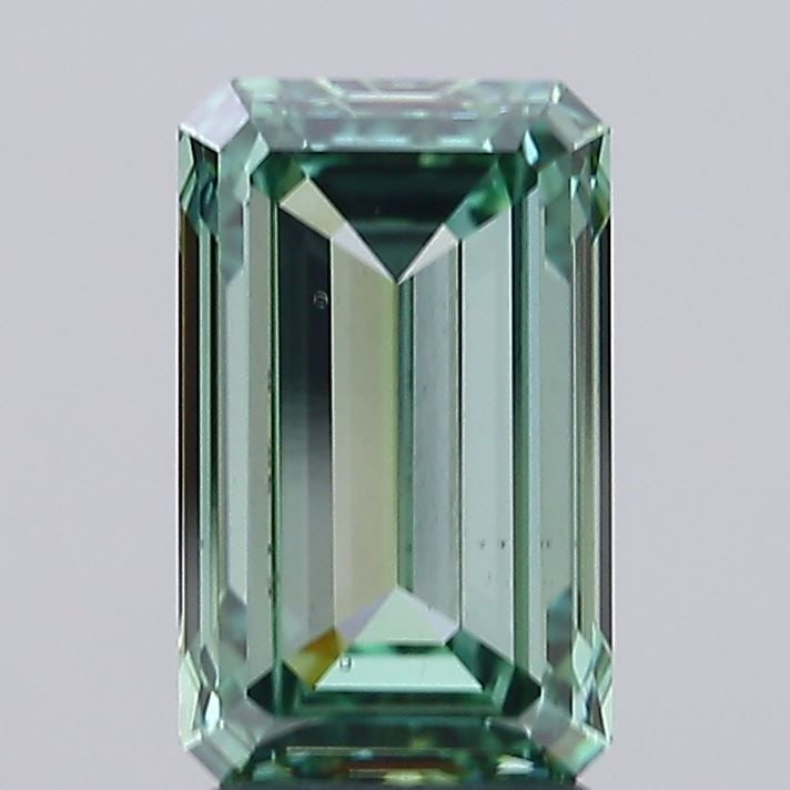 Loose Diamond - EMERALD 3.01ct Fancy Vivid Green VS2: Loose Diamond - EMERALD 3.01ct Fancy Vivid Green VS2 Source: This is a real non-mined Diamond that has been grown in a lab Shape: EMERALD Carats: 3.01 Color: Fancy Vivid Green Certification: IGI Video