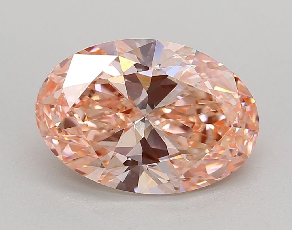 Loose Diamond - OVAL 3.0ct Fancy Orange Pink VS2: Loose Diamond - OVAL 3.0ct Fancy Orange Pink VS2 Source: This is a real non-mined Diamond that has been grown in a lab Shape: OVAL Carats: 3.0 Color: Fancy Orange Pink Certification: IGI Video: