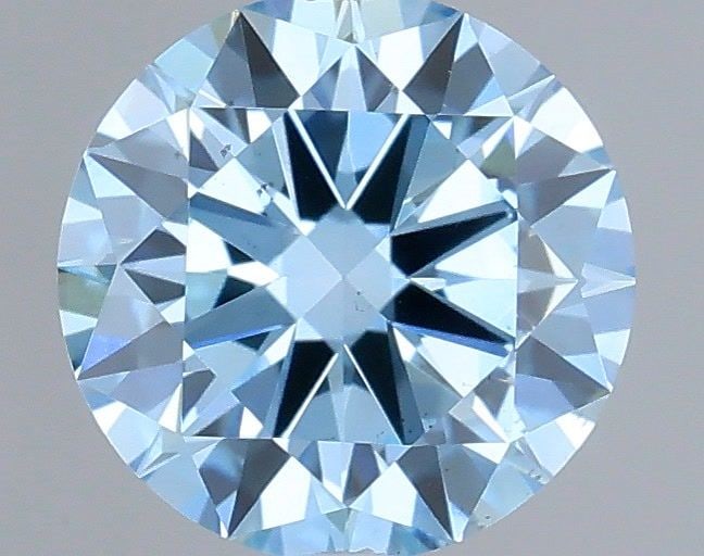 Loose Diamond - ROUND 0.61ct Fancy Vivid Blue VS2: Loose Diamond - ROUND 0.61ct Fancy Vivid Blue VS2 Source: This is a real non-mined Diamond that has been grown in a lab Shape: ROUND Carats: 0.61 Color: Fancy Vivid Blue Certification: IGI Video: