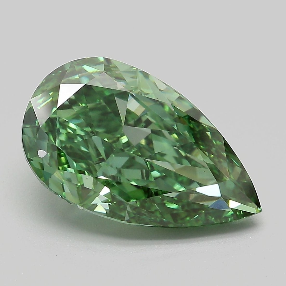 Loose Diamond - PEAR 5.11ct Fancy Vivid Green VS1: Loose Diamond - PEAR 5.11ct Fancy Vivid Green VS1 Source: This is a real non-mined Diamond that has been grown in a lab Shape: PEAR Carats: 5.11 Color: Fancy Vivid Green Certification: IGI Video: