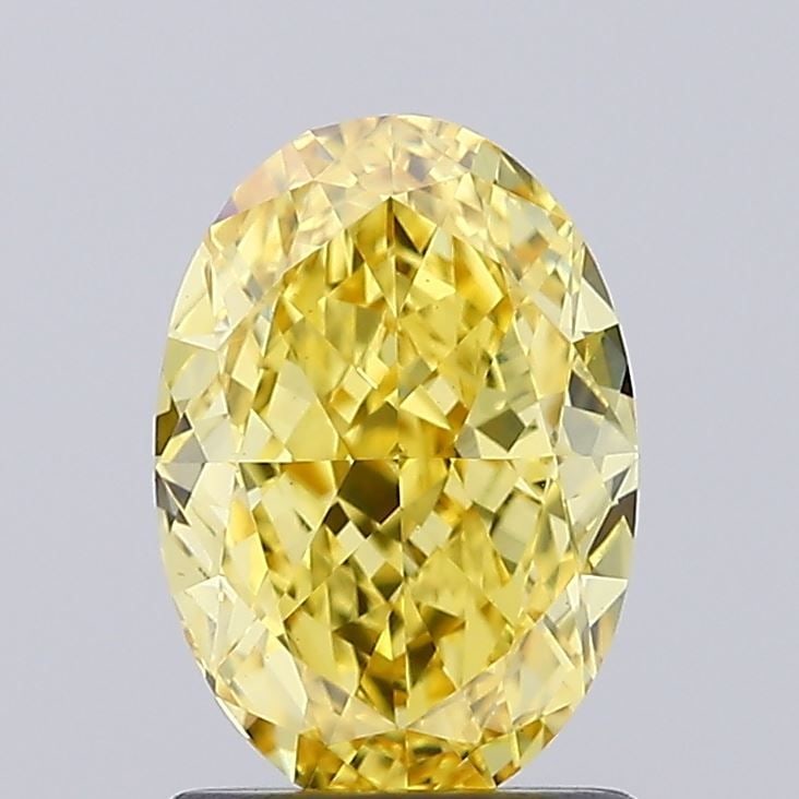 Loose Diamond - OVAL 1.54ct Fancy Vivid Yellow VS2: Loose Diamond - OVAL 1.54ct Fancy Vivid Yellow VS2 Source: This is a real non-mined Diamond that has been grown in a lab Shape: OVAL Carats: 1.54 Color: Fancy Vivid Yellow Certification: IGI Video: